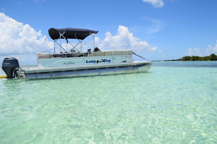 a small boat in a large body of water