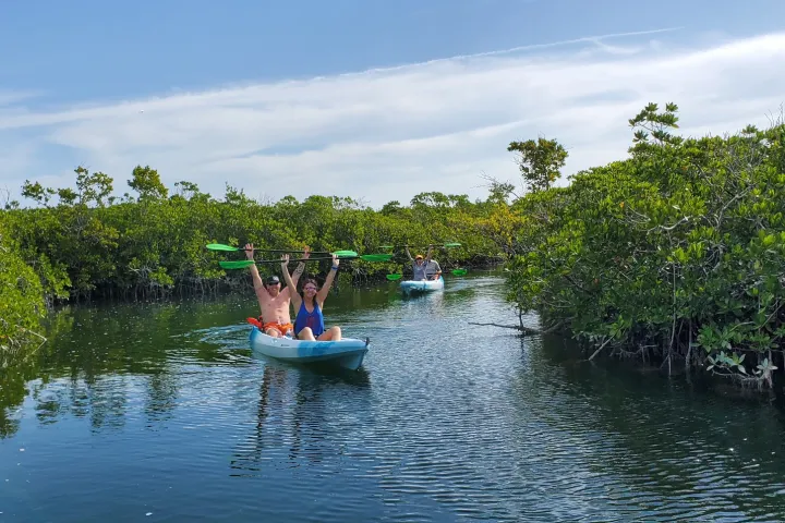 a small boat in a body of water